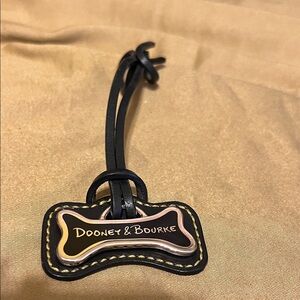 Dooney & Bourke Black and Gold Bone Charm